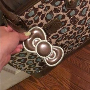 Hello Kitty turquoise and grey cheetah print purse